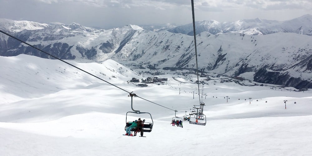 view of the ski lift on a snowy mountain